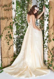 Style #1802L, sleeveless a-line wedding dress features v-neckline, open back, 3-D floral embroidery down the skirt with side pockets, available in ivory and caramel