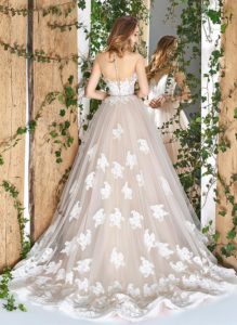 Style #1803L, sleeveles ball gown wedding dress with illusion sweetheart neckline and lace embroidery, available in ivory and powder