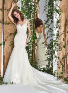 Style #1806L, sequined lace fit and flare wedding dress with sweetheart neckline and spaghetti straps, available in ivory and cream