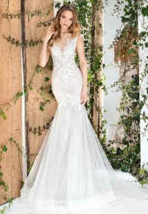 Style #1810L, fit and flare silhouette wedding gown with lace embroidery, illusion plunging neckline, and keyhole back, available in ivory and light pink