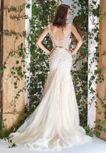 Style #1811L, sleeveless fit and flare wedding dress with deep v neck, 3-D floral embroidery and slit down the skirt, available in ivory and ivory-nude