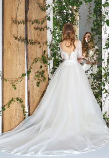 Style #1812LS, three-quartered sleeve ball gown wedding dress, designed with the illusion neckline and lace scalloped hem, available in ivory