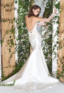 Style #1814L, satin trumpet wedding dress features a sweetheart neckline, lace embroidery down the skirt, crisscross spaghetti straps over the low back, available in ivory