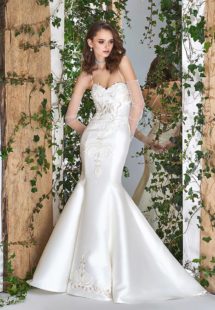 Style #1814L, satin trumpet wedding dress features a sweetheart neckline, lace embroidery down the skirt, crisscross spaghetti straps over the low back, available in ivory