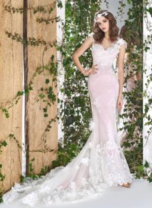 Style #1815L, cap sleeve wedding gown, designed with illusion sweetheart neckline and v-back, 3-D flower decor and lace embroidery, available in ivory and ivory-pink