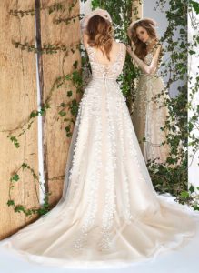 Style #1818L, plunging neckline a-line wedding dress with handmade 3-D floral embroidery down the skirt, available in ivory and caramel