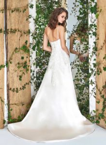 Style #1822L, satin fit and flare wedding dress with sweetheart neckline, spaghetti straps, and lace embroidery down the top, available in cream and ivory