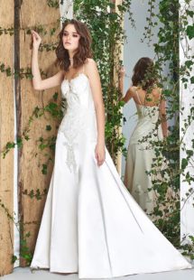 Style #1822L, satin fit and flare wedding dress with sweetheart neckline, spaghetti straps, and lace embroidery down the top, available in cream and ivory