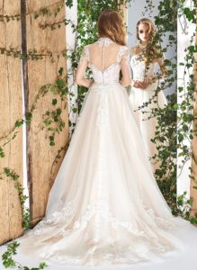 Style #1827L, high neck a-line wedding dress, designed with illusion sweetheart neckline, long sleeves, and lace embroidery, available in ivory and ivory-pink