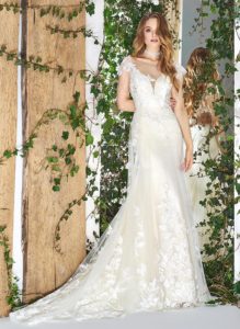 Style #1832L, cap sleeve fit and flare wedding dress features illusion sweetheart neckline, open back, 3D overlay skirt, beading, and floral embroidery, available in ivory and caramel