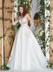 Style #1833L, illusion neckline ball gown wedding dress with organza skirt, and open v-back, available in ivory