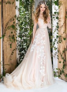 Style #1835L, floral embroidered a-line wedding dress features long sleeves, illusion neckline, and keyhole back, available in ivory and ivory-gold