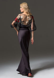 Style #334, fit-and-flare evening gown features flower embroidered illusion top with dolman three-quarter length sleeves, available in black