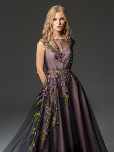 Style #340, cap sleeve maxi dress with an illusion neckline and floral embroidery down the skirt, available in black, ivory, pink-ivory