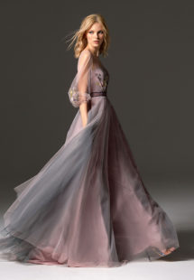 Style #343, long evening gown with an illusion neckline, three-quarter length bishop sleeves, floral embroidery, and velvet belt, available in grey, pink-ivory, ivory