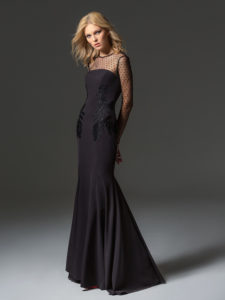 Style #344, fit-and-flare evening gown with embroidery detailing, illusion polka dot neckline, long sleeves, and low back, available in black, ivory, scarlet, dark blue, blue, pink-ivory, green, grey