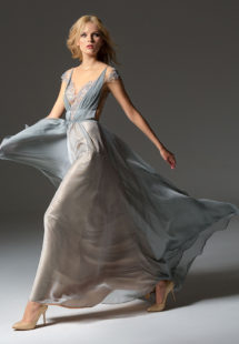 Style #352, cap sleeve evening gown features an illusion neckline, beaded embroidery on the top, and illusion V-back, available in grey, smoky pink, burgundy, ivory