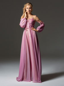 Style #353, bishop sleeve evening gown features an illusion neckline and 3-D floral embroidery, available in ivory, grey, coral, burgundy, pink-lilac