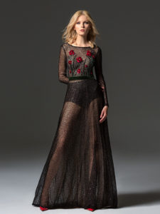 Style #354, long sleeve sequinned evening gown features flower 3-D embroidery on the top, velvet belt, keyhole open back, and a full-length sheer skirt, available in black