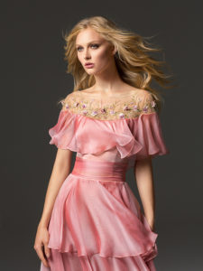 Style #357, off-the-shoulder evening gown with cape sleeves, illusion neckline and floral embroidery, available in ivory, grey, coral, burgundy, pink-lilac