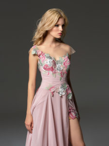 Style #360, cap sleeve maxi dress with an illusion neckline, embroidered top, and front slit on the skirt, available in pink-ivory