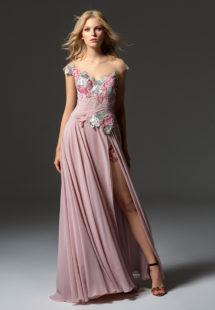 Style #360, cap sleeve maxi dress with an illusion neckline, embroidered top, and front slit on the skirt, available in pink-ivory