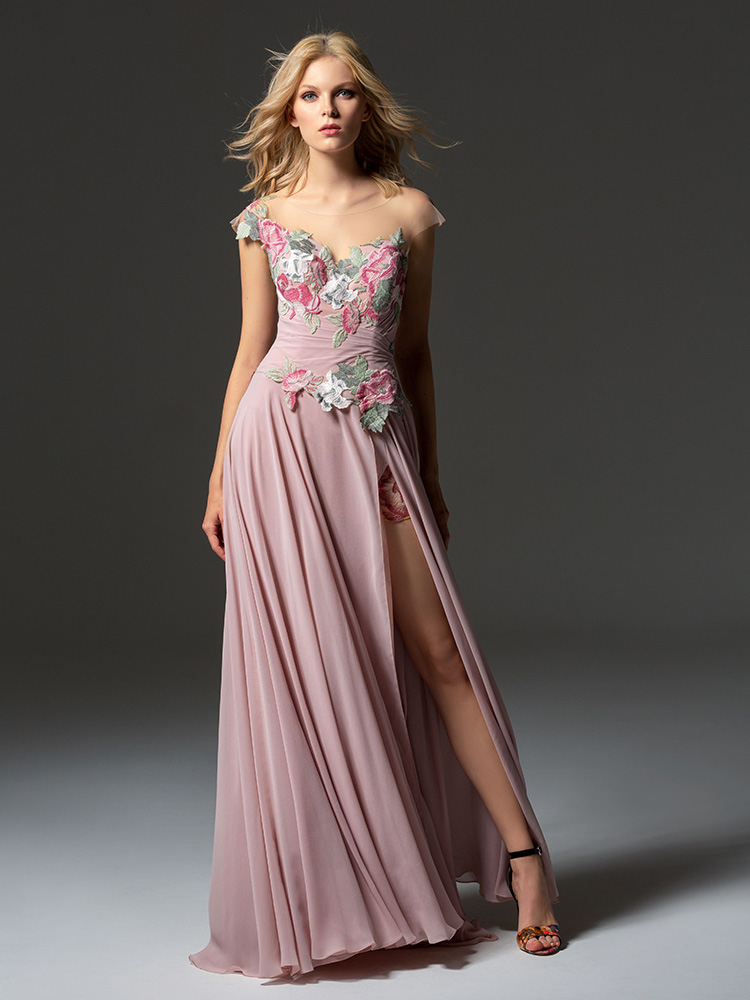 Style #360, cap sleeve maxi dress with an illusion neckline, embroidered top, and front slit on the skirt, available in pink-ivory