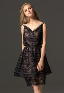 Style #361, knee-length lace cocktail dress with beaded overlay top and belt, available in black