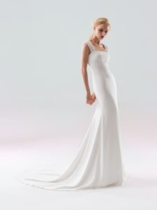 Style #18/1901L, fit-and-flare wedding gown with embellished straps and low illusion back, available in ivory