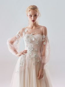 Style #18/1907L, bishop sleeve A-line wedding dress with floral lace embroidery and illusion back, available in ivory-pink