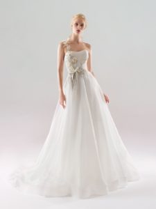 Style #18/1909L, one strap A-line wedding dress with 3-D floral embroidered top and flowy organza skirt, available in ivory