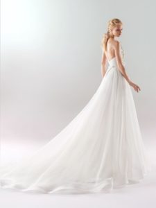 Style #18/1909L, one strap A-line wedding dress with 3-D floral embroidered top and flowy organza skirt, available in ivory