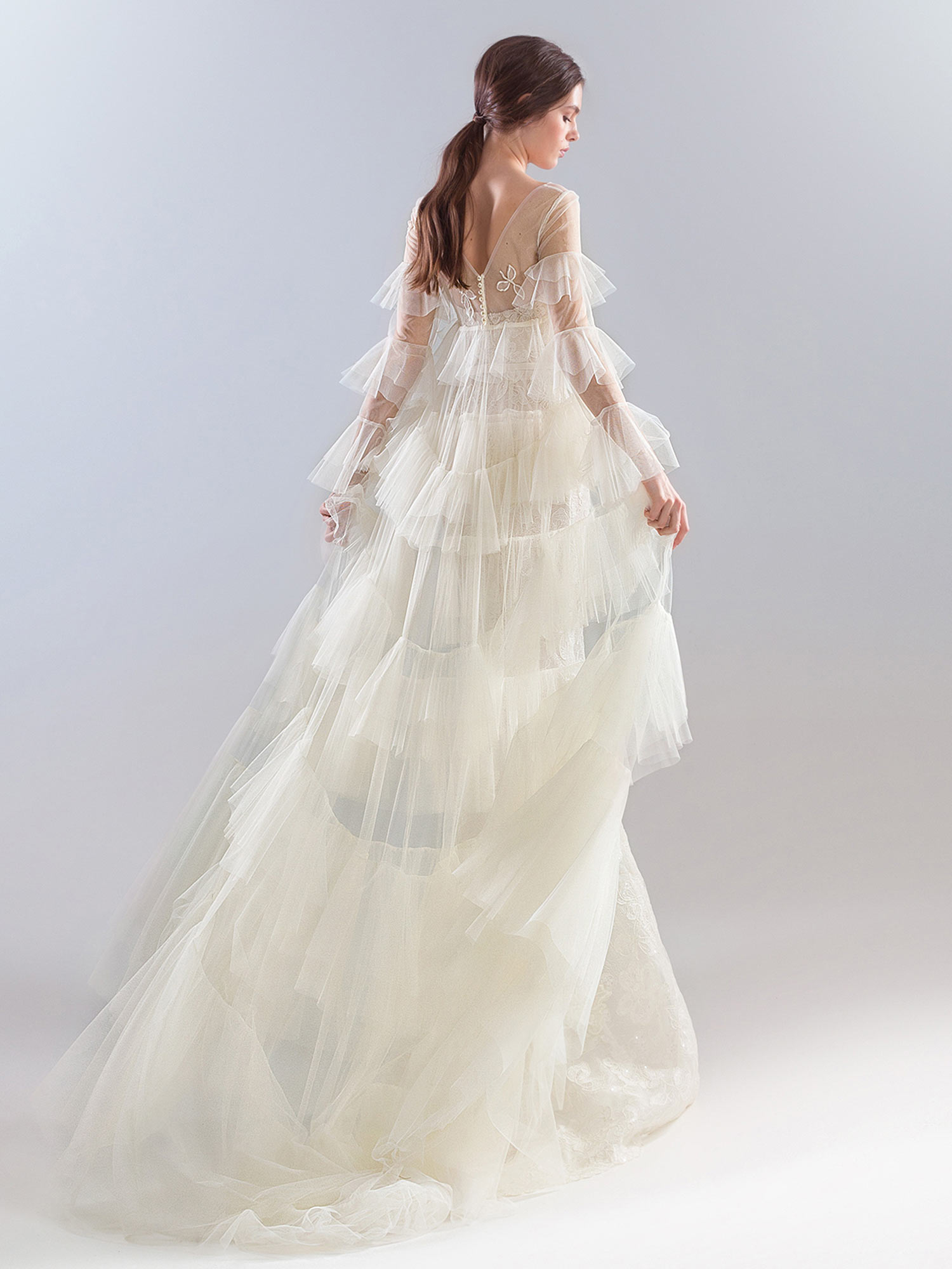 Style #1927L, available in dark ivory (photo), ivory; Style #1927-7 (cape), available in ivory Style #1927L, available in dark ivory (photo), ivory; Style #1927-7 (cape), available in ivory