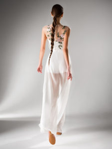 Style #410-8, Flowy jumpsuit with an illusion neckline, available in powder, ivory, black, red, berry