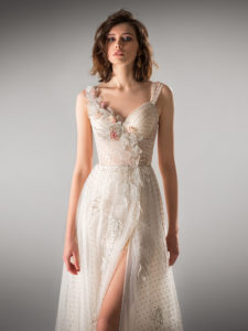 Style #421, A-line evening gown with a high slit and floral applique, available in nude, ivory