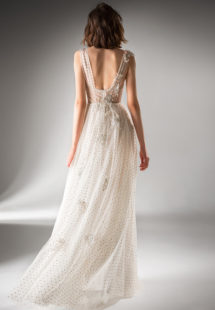 Style #421, A-line evening gown with a high slit and floral applique, available in nude, ivory