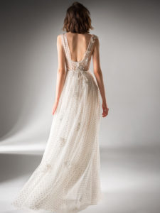 Style #421, A-line evening gown with a high slit and floral applique, available in nude, ivory
