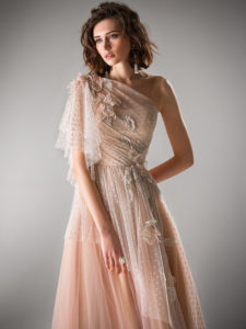 Style #422, Tulle evening gown with one shoulder sleeve, available in powder, ivory