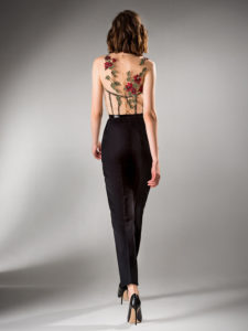 Style #430-8, Jumpsuit with illusion bodice and flower applique, available in powder, ivory, black, red