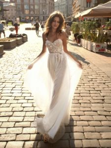 A-line wedding dress with sweetheart bodice and cape straps