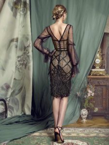 Style #445, Sheath gown with feathered skirt, available in black