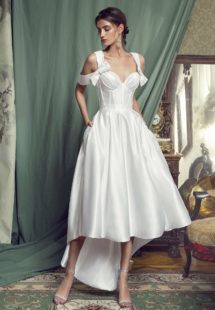 Style #450, High-low cocktail dress with a bustier bodice, available in black, crimson, eggplant, grey, purple, white, ivory