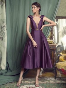 Style #451, Evening gown with plunging neckline and voluminous skirt, available in black, crimson, eggplant, grey, purple, white, ivory