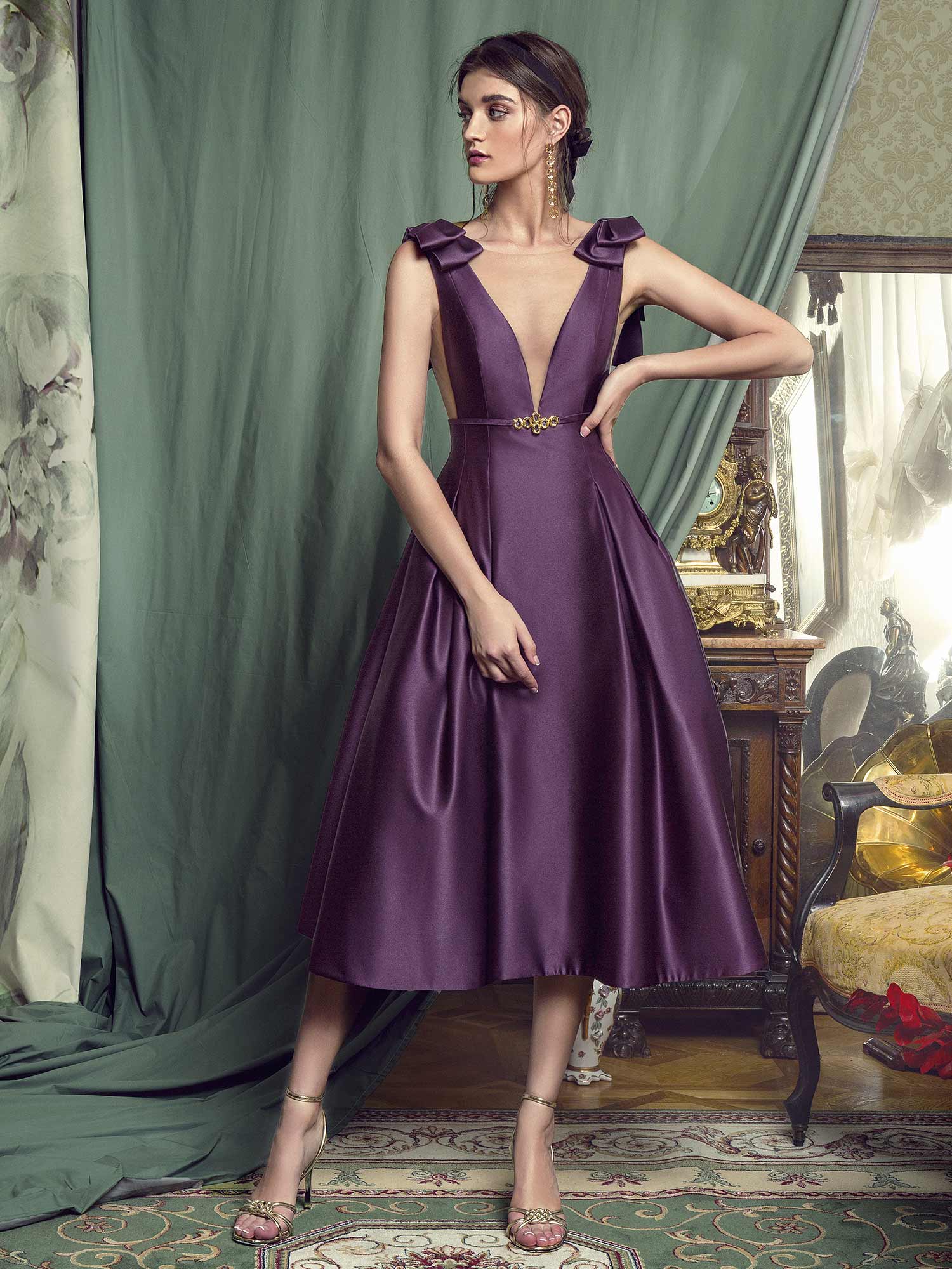 Style #451, Evening gown with plunging neckline and voluminous skirt, available in black, crimson, eggplant, grey, purple, white, ivory