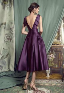 Style #451, Evening gown with plunging neckline and voluminous skirt, available in black, crimson, eggplant, grey, purple, white, ivory