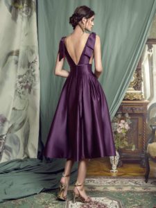 Style #451, Evening gown with plunging neckline and voluminous skirt, available in black, crimson, eggplant, grey, purple, white, ivory