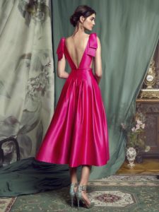 Style #451, Evening gown with plunging neckline and voluminous skirt, available in black, crimson, eggplant, grey, purple, white, ivory