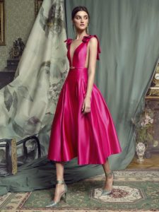 Style #451, Evening gown with plunging neckline and voluminous skirt, available in black, crimson, eggplant, grey, purple, white, ivory