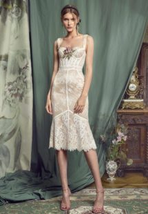 Style #461, Sheath lace dress with bustier bodice, available in black, ivory