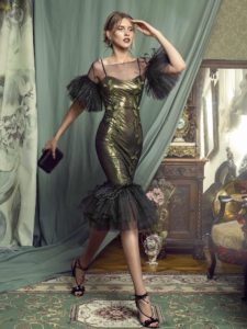 Style #473, Form-fitting cocktail gown with ruffled tulle, available in black-gold